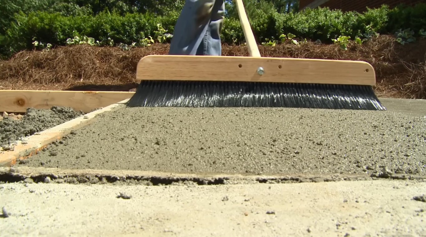 Professional concrete finishing tool smoothing fresh concrete in San Tan Valley